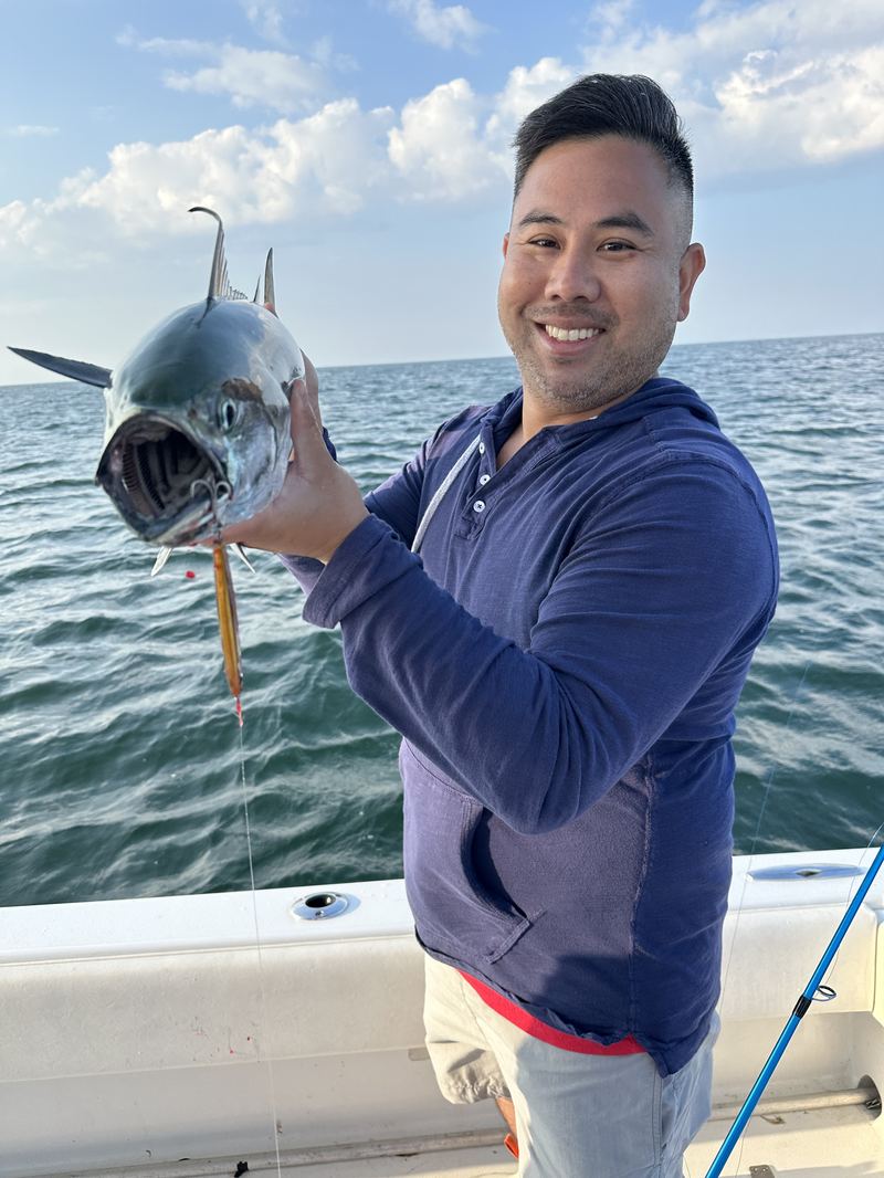 Angler with a big bluefin tuna caught offshore of Cape Cod