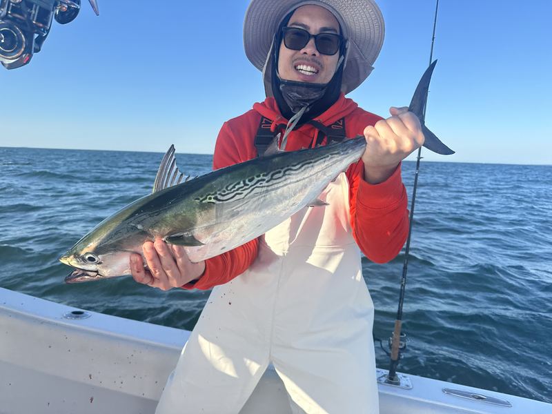 Angler with a bonito caught off Cape Cod