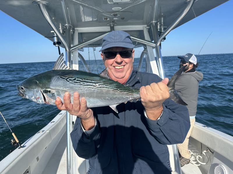 Angler with a bonito on a Cape Cod charter