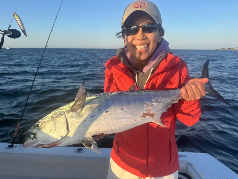 Angler with a bonito on a Cape Cod fall charter