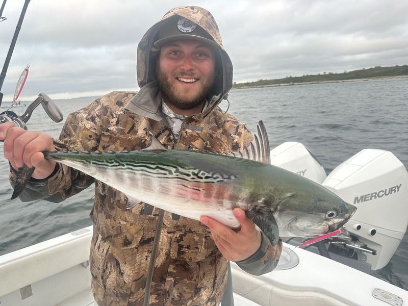 Angler with a bonito on a Cape Cod fall charter