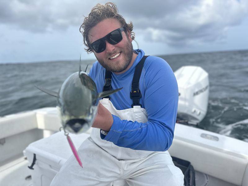 Angler with a false albacore on a Cape Cod light-tackle charter