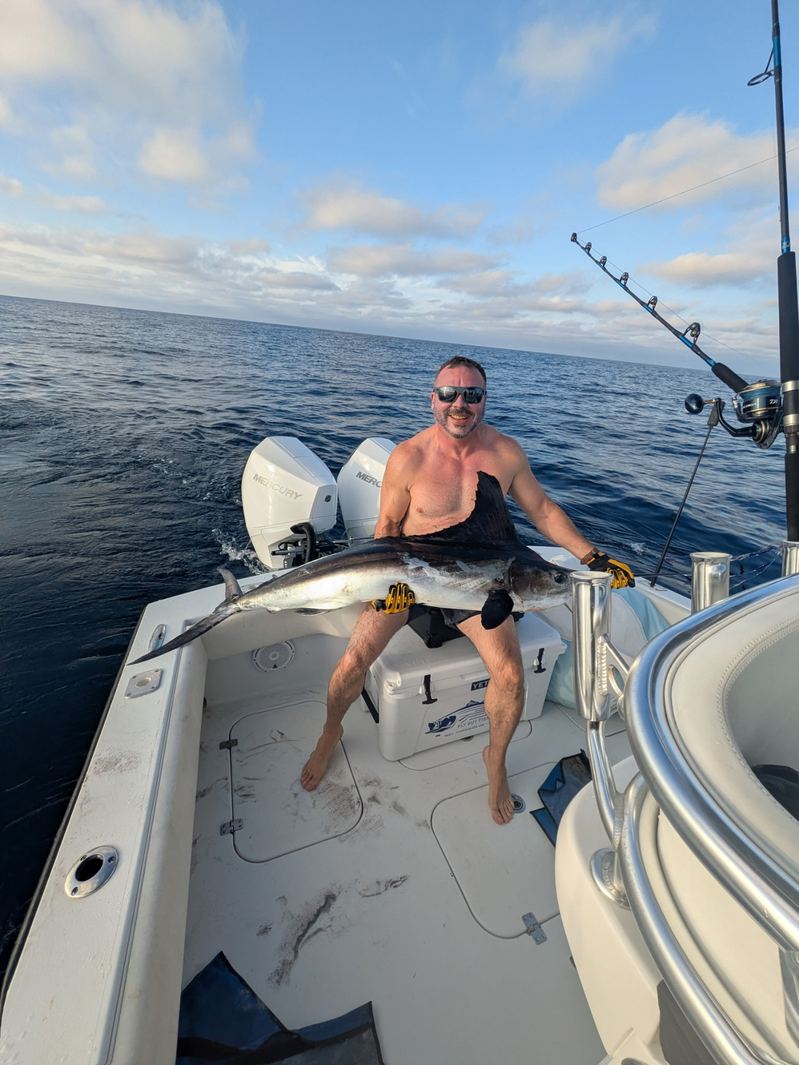 Captain Nick Kathmann with a swordfish caught offshore