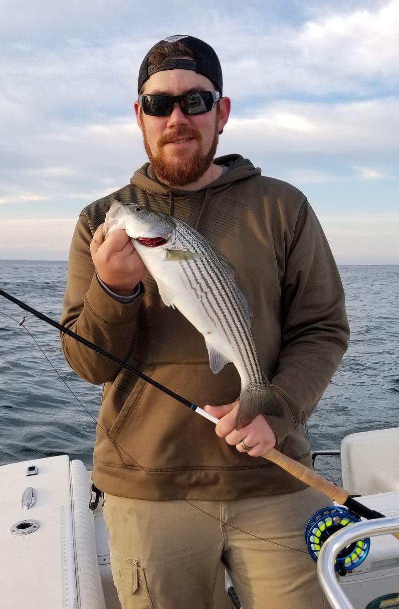 Ryan's first striped bass on the fly - Cape Cod 2019