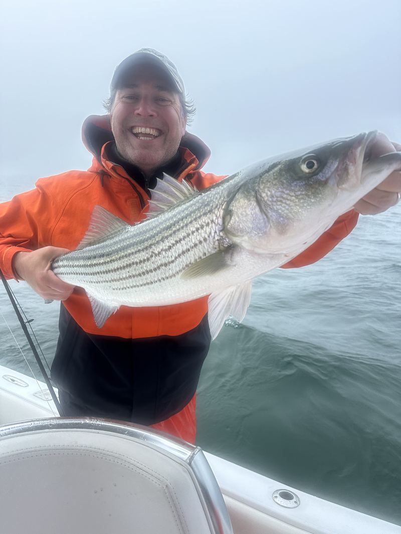 Spencer with the Cape Cod Striper Grip and Grin!