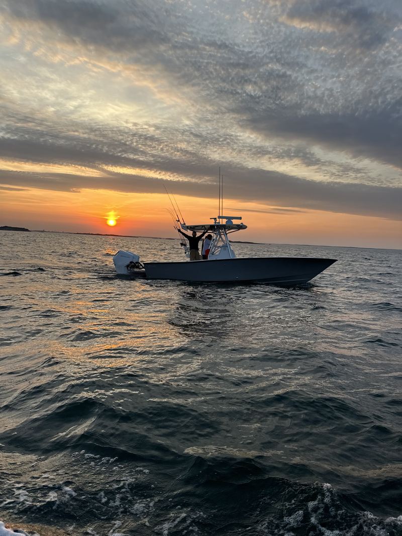 The charter boat at sunset on Cape Cod Bay